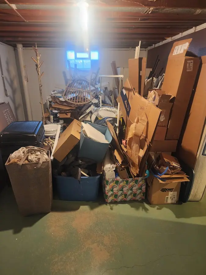 Roll-off dumpster container at job site for Yard Waste Dumpster Rental in Barton